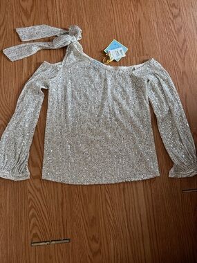 CeCe Shimmery Sequin Off-Shoulder Top in Champagne